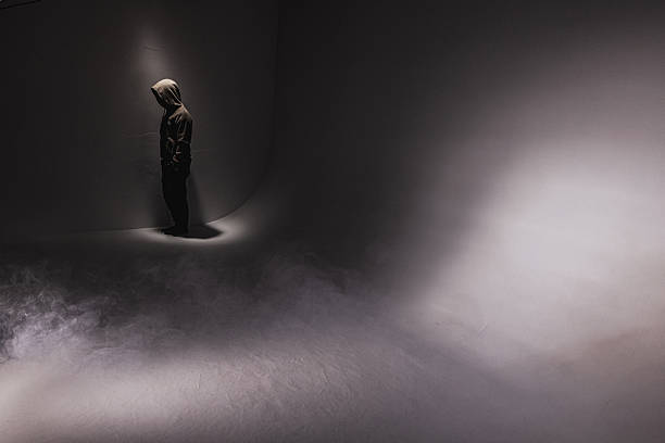 Creepy male silhouette. Wanderer in dark