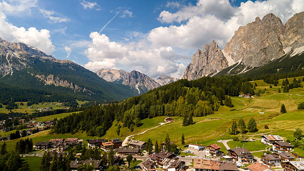 istock Village meadows below Dolomite escarpments 2243815642