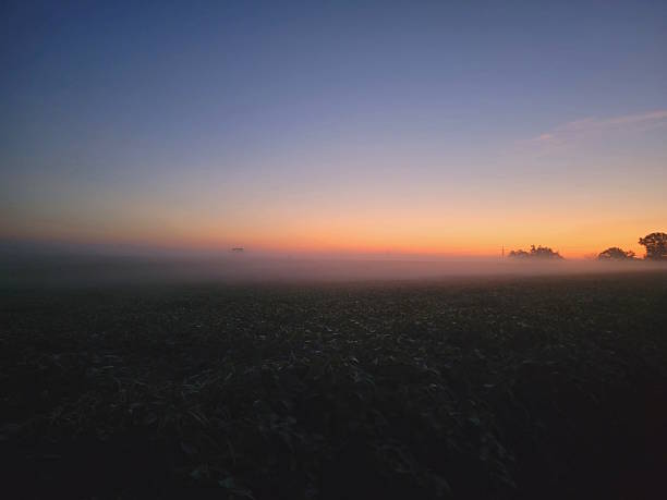 Sunrise in the country on a foggy morning