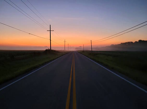 istock Sunrise on a Country Road 2243815694