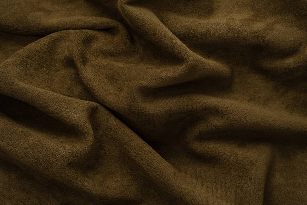 istock Green fabric texture as a background. Top view. 2243825205