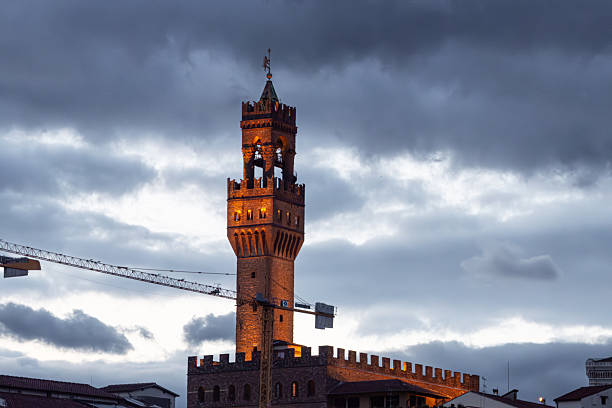 Tower of Palazzo Vecchio and sky with clouds