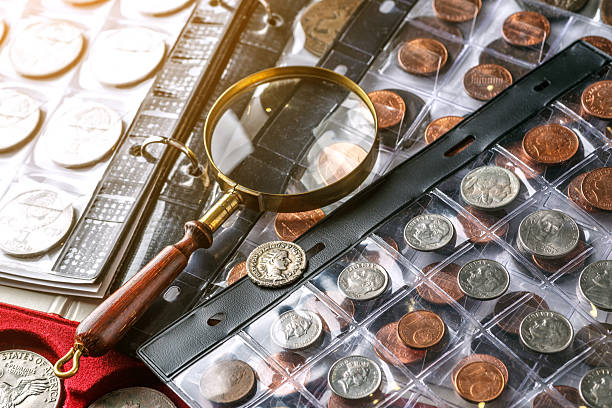 istock Numismatics.Authentic silver denarius, antoninianus of ancient Rome. A collector holds an old coin.Ancient coin of the Roman Empire.Magnifying glass 2243829971