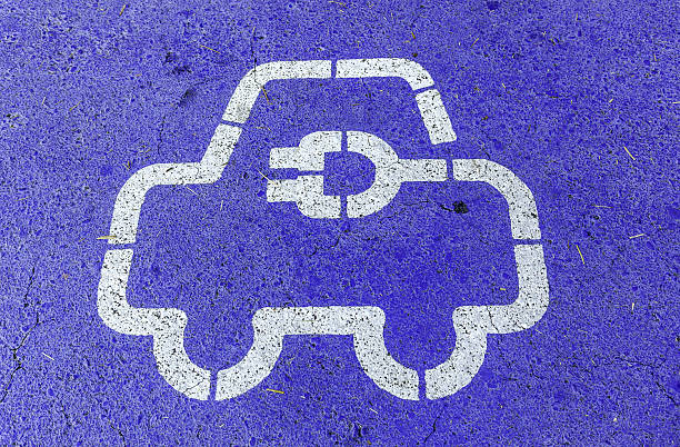 istock Electric car asphalt sign 2243830784