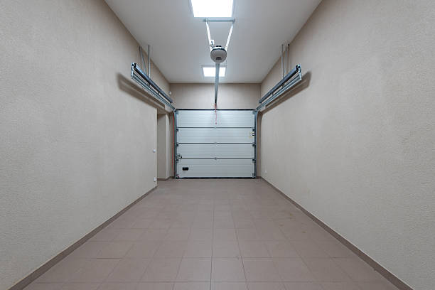 istock Modern Minimalist Empty Garage Interior With Closed Overhead Door 2243830805