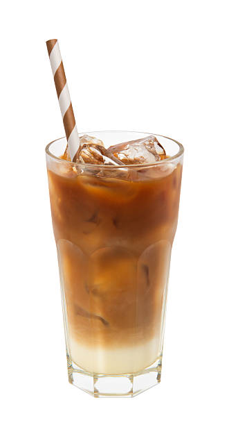 Iced cold coffee caramel macchiato isolated on white background.