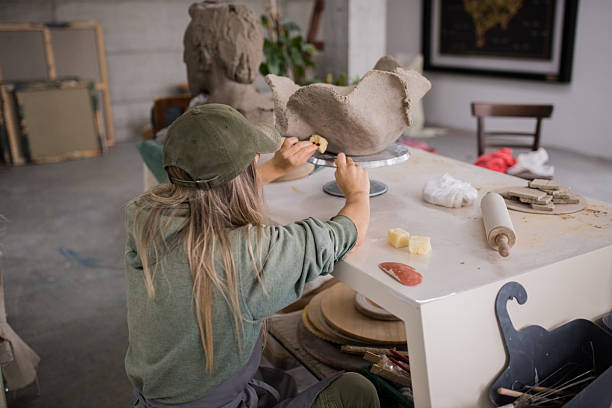 istock Woman finishing pottery project 2243842893
