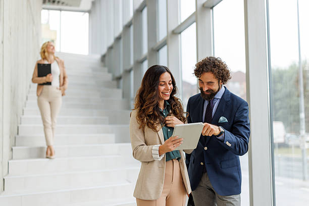 istock Business colleagues collaborating on tablet during office meeting 2243847934