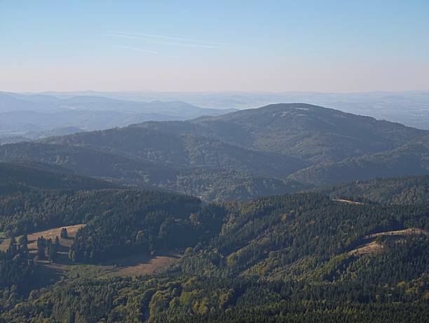 istock peaceful hills with dawn glow, calm elevated terrain fading into expansive horizon under soft light 2243849233