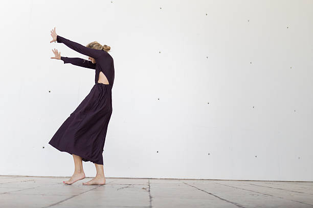 istock Woman dancing barefoot expressing freedom and movement 2243850765