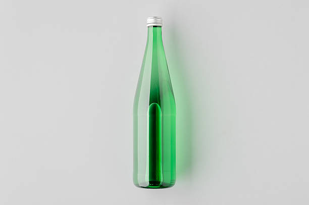 istock Green glass water bottle mockup 2243856637