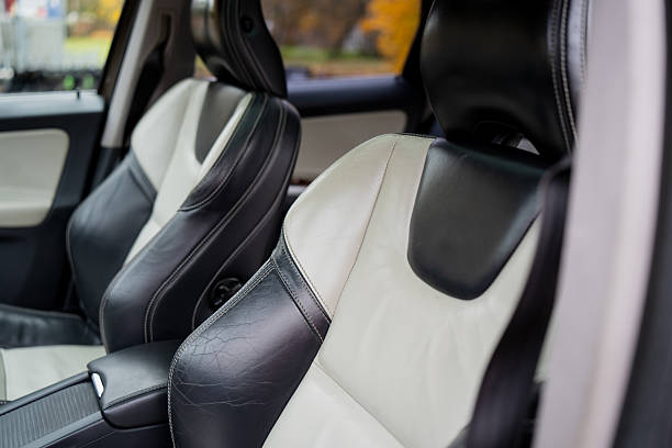 istock Modern car interior with black and white leather seats and ergonomic headrests showing premium upholstery craftsmanship and comfort-focused design details 2243856913