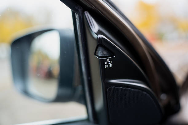 istock Modern car exterior mirror with active blind spot monitoring sensor emphasizing safety innovation and smart automotive design for enhanced driving awareness 2243856925