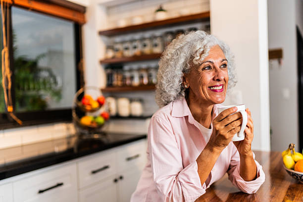 istock American senior woman contemplating while drinking coffee at home 2243858057