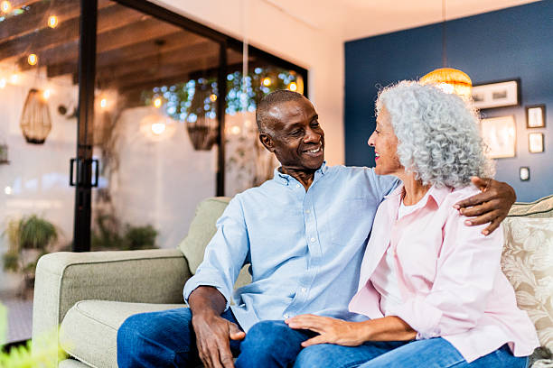 istock American senior couple talking at home 2243858102