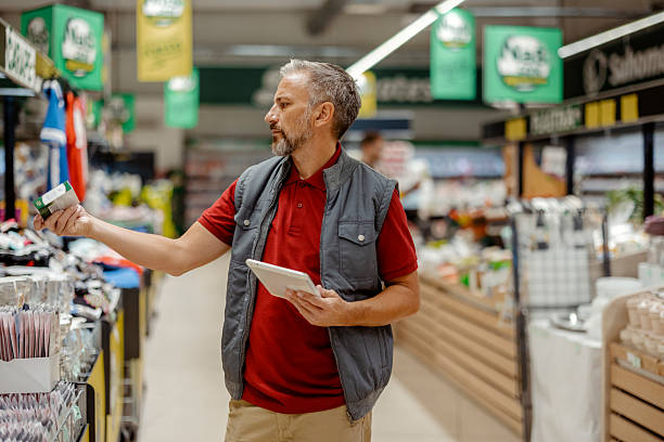 istock Grocery Store Staff Member Using Tablet for Inventory Control 2243860056