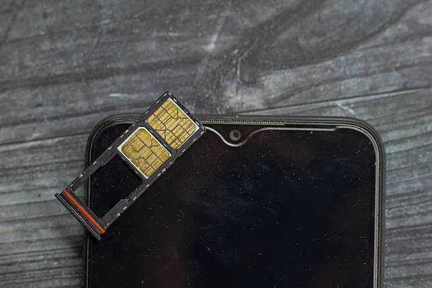 istock dual nano sim card smartphone removed, dual nano sim card for internet 2243861686