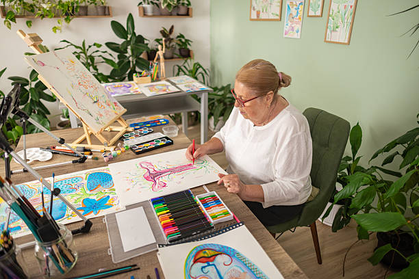 istock Senior Woman Creating Art at Home Studio 2243861812