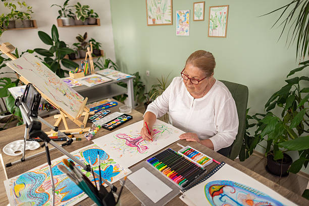 istock Senior Woman Creating Art at Home Studio 2243861815