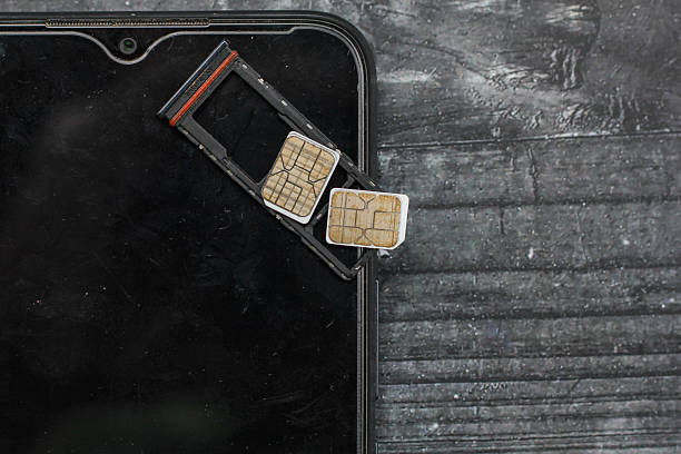 istock dual nano sim card smartphone removed, dual nano sim card for internet 2243862507