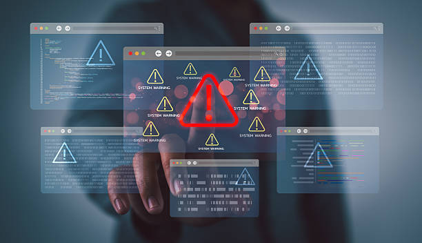 istock Cybersecurity alert concept. Man hand interacting with virtual warning windows, illustrating system errors, hacking risks, and digital data protection in a secure environment. 2243867875