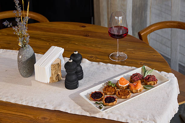 istock An Elegant Dining Table with Gourmet Food and Fine Wine offers a luxurious hosting experience 2243870098