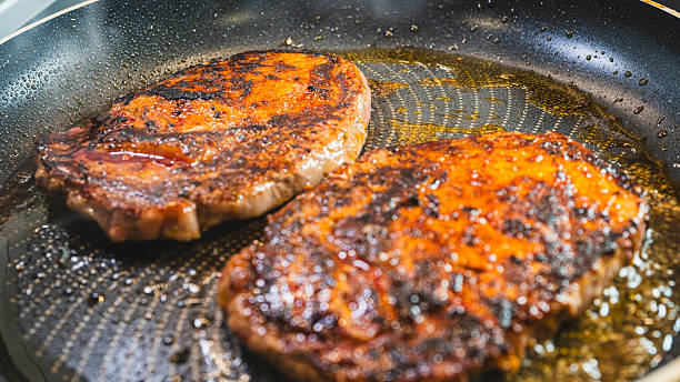 istock Ribeye Steak Frying in Pan 2243872720