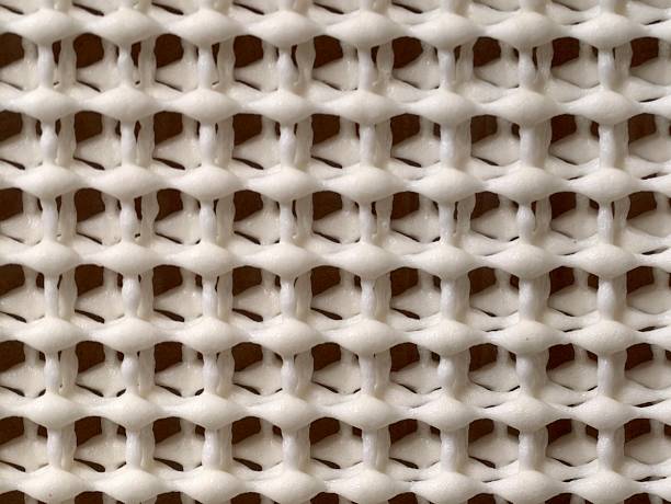 istock close examination reveals tightly interlaced fibers forming structured grid pattern in seating 2243873443