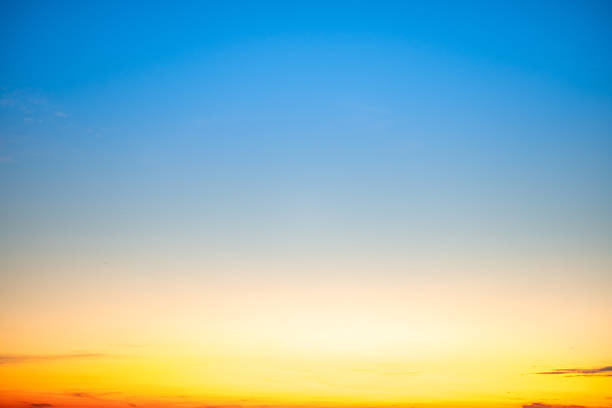 Beautiful , luxury soft gradient orange gold clouds and sunlight on the blue sky perfect for the background, take in evening,Twilight, Large size, high definition landscape photo, savanna view