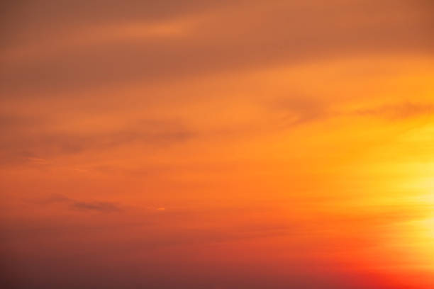 Beautiful , luxury soft gradient orange gold clouds and sunlight on the blue sky perfect for the background, take in evening,Twilight, Large size, high definition landscape photo, savanna view