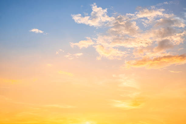istock Beautiful , luxury soft gradient orange gold clouds and sunlight on the blue sky perfect for the background, take in evening,Twilight, Large size, high definition landscape photo 2243874069