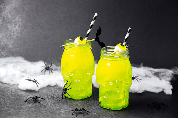 istock Halloween skull drinks with spiders and cobwebs spooky party celebration 2243874960