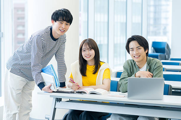istock College student looking at smartphone in classroom 2243876247