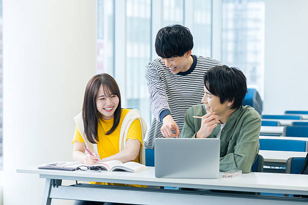 istock College student looking at smartphone in classroom 2243876248