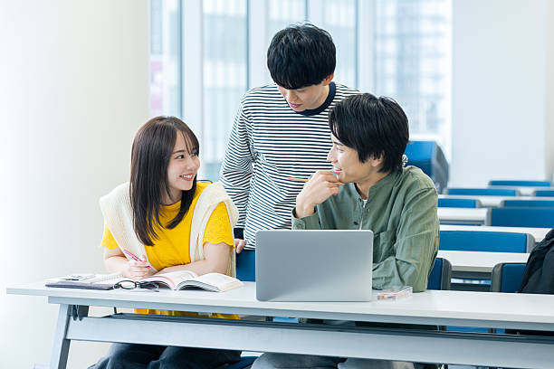 istock College student looking at smartphone in classroom 2243876253