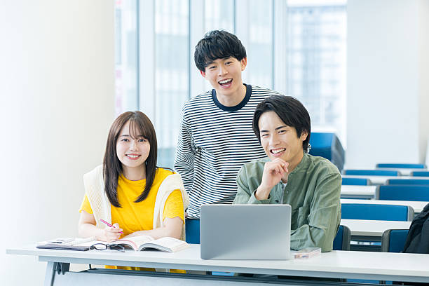 istock College student looking at smartphone in classroom 2243876255