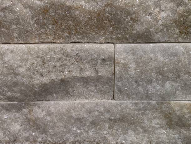 stone masonry with rough texture suitable for fireplace surrounds and building restoration