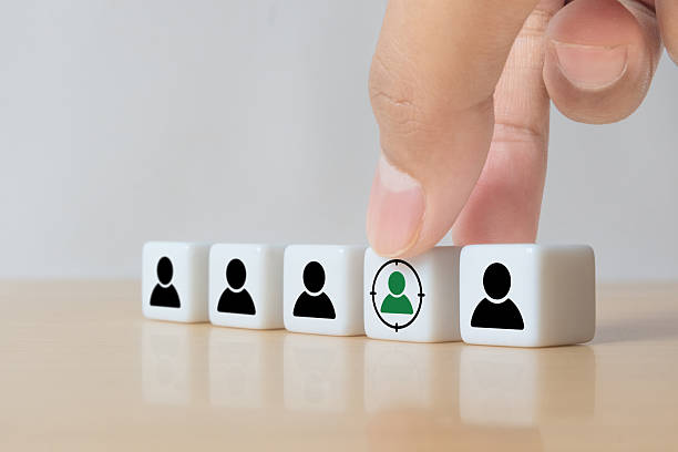 istock Target customer, buyer persona, marketing segmentation, job recruitment concept. Personalization marketing, customer centric strategies. Putting dice with focused on target customer symbols 2243878231