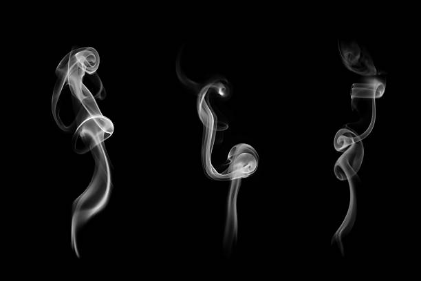 istock Abstract smoke on black background creating elegant and mysterious shapes. Perfect for design creativity, energy, spirituality, and minimal modern art. Ideal for advertising and background visuals. 2243881444