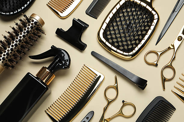 istock Different hairdresser tools on beige background, flat lay 2243881465