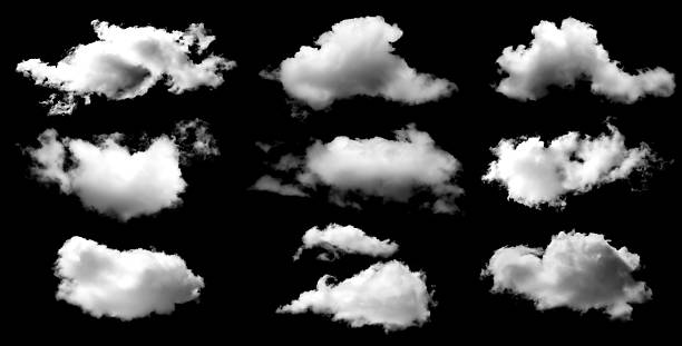 istock Realistic fluffy white clouds isolated on black background. Perfect for photo compositing, sky design, digital art, and weather illustration. High-quality PNG for creative projects and visual effects. 2243882093