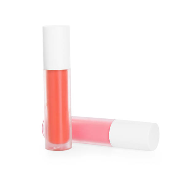 istock Two lip glosses isolated on white. Cosmetic products 2243882887