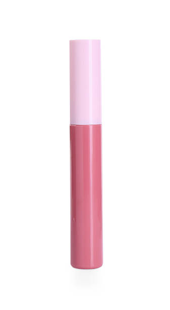 istock One pink lip gloss isolated on white. Cosmetic product 2243882895