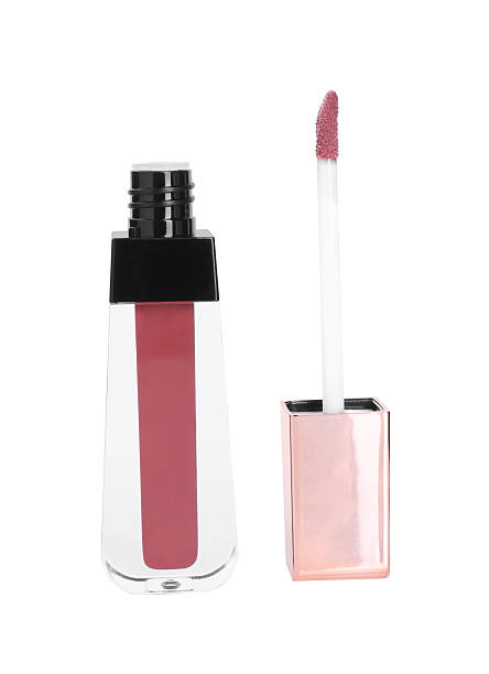 istock Lip gloss and applicator isolated on white. Cosmetic product 2243882929