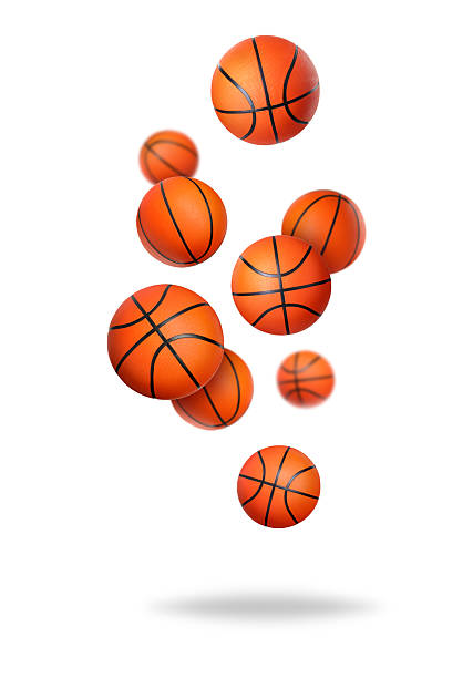 istock Many basketball balls falling on white background 2243884754
