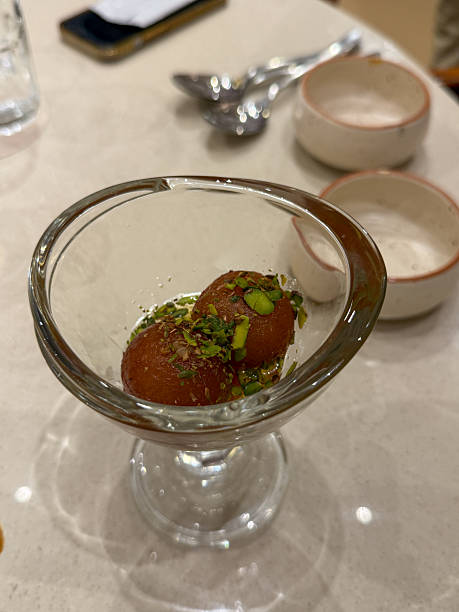 istock A dessert in a glass bowl with nuts on top 2243888525