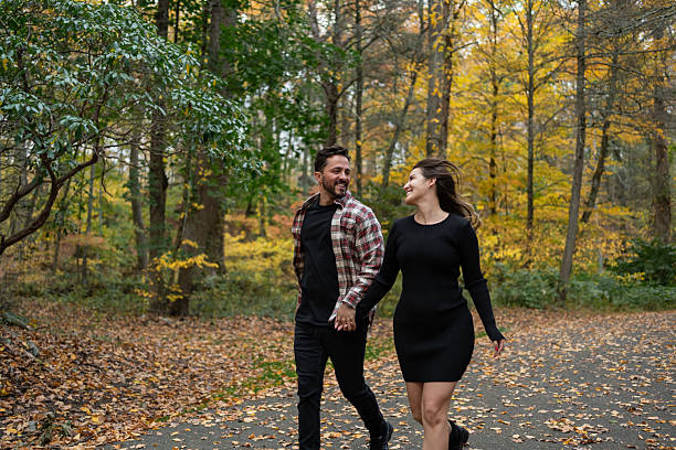 istock Couple together in a park during Autumn 2243892980
