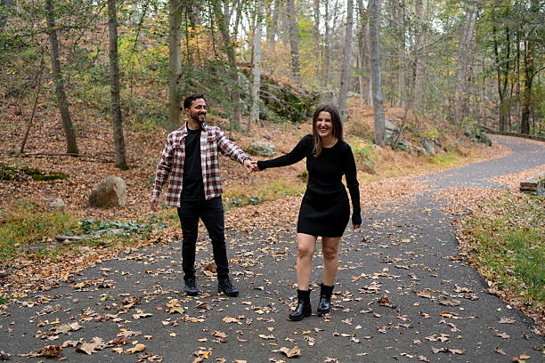 istock Couple together in a park during Autumn 2243892985