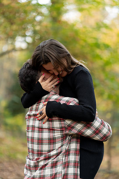 istock Couple together in a park during Autumn 2243892995