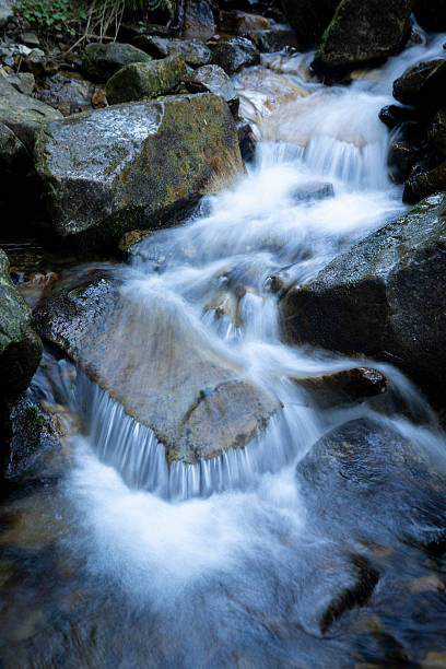 istock A mountain waterfall among rocks in the Carpathian Mountains in summer 2243902278